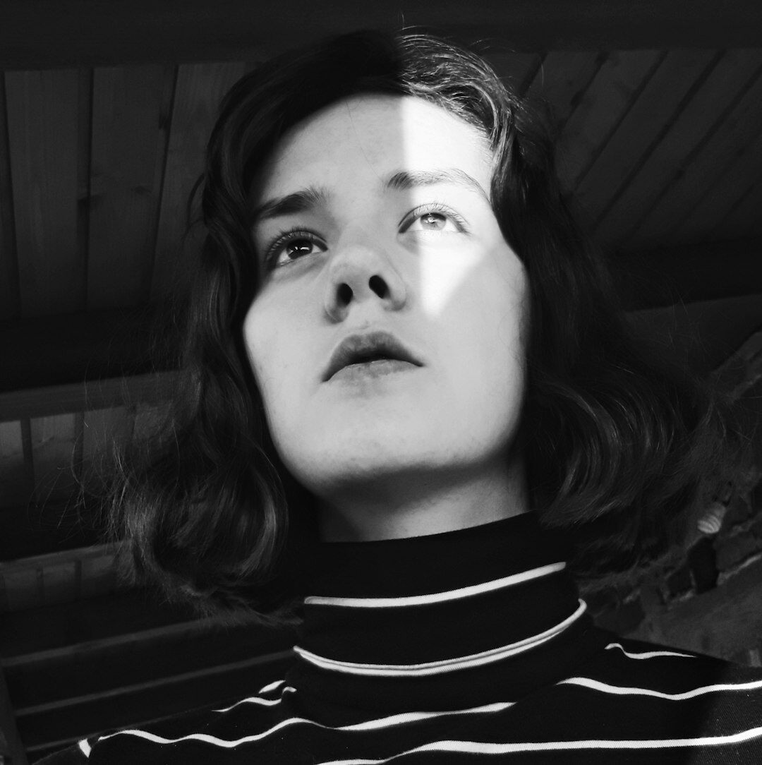 Studio portrait of a young Croatian woman reporter