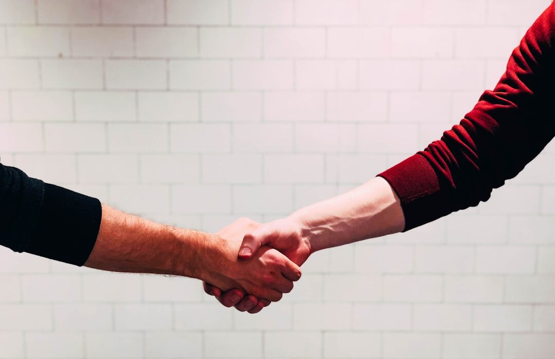 people shaking hands